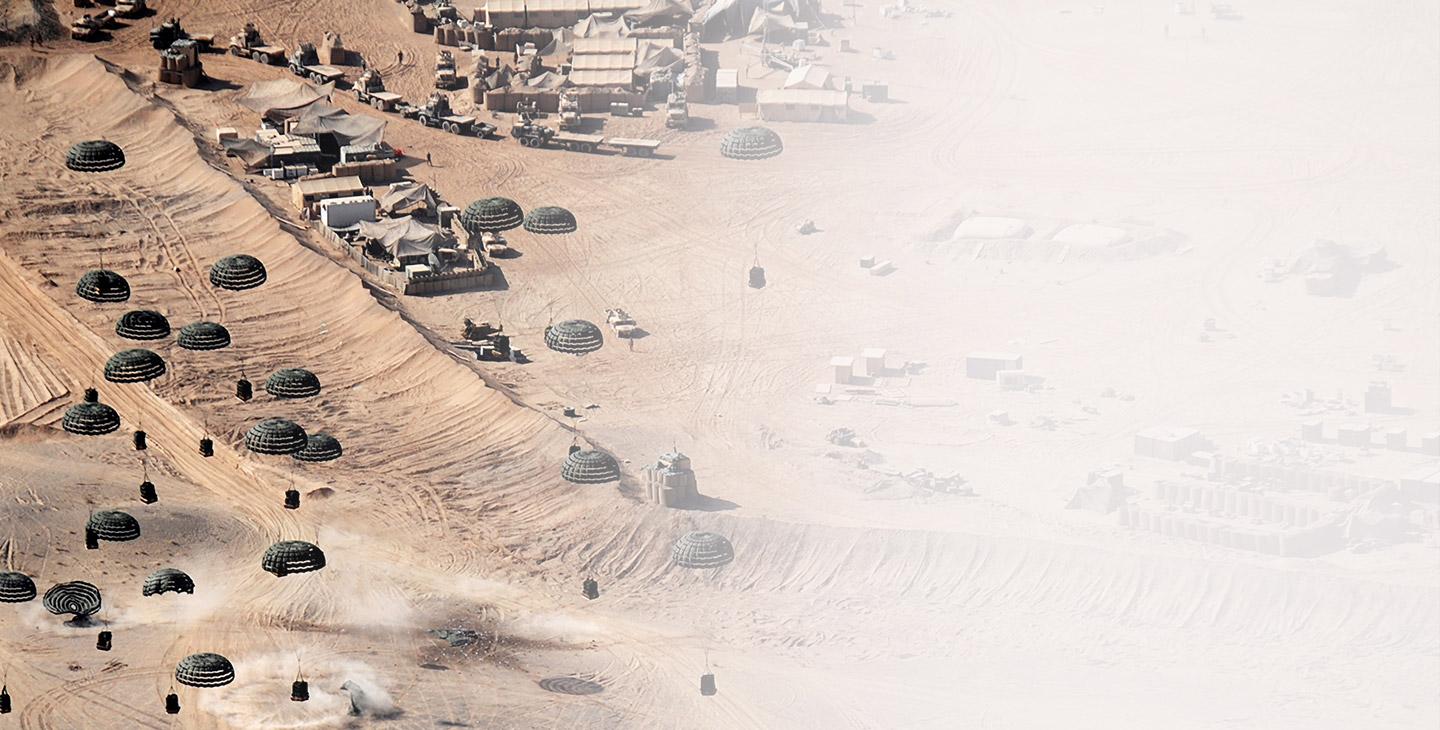 在沙漠中的前沿作战基地，物资从降落伞上空投下来